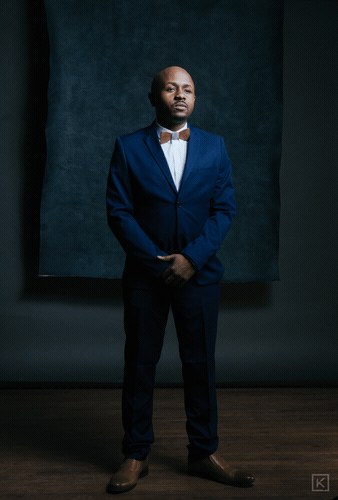 Ryan Perez standing, host of The Hustle Zone Podcast