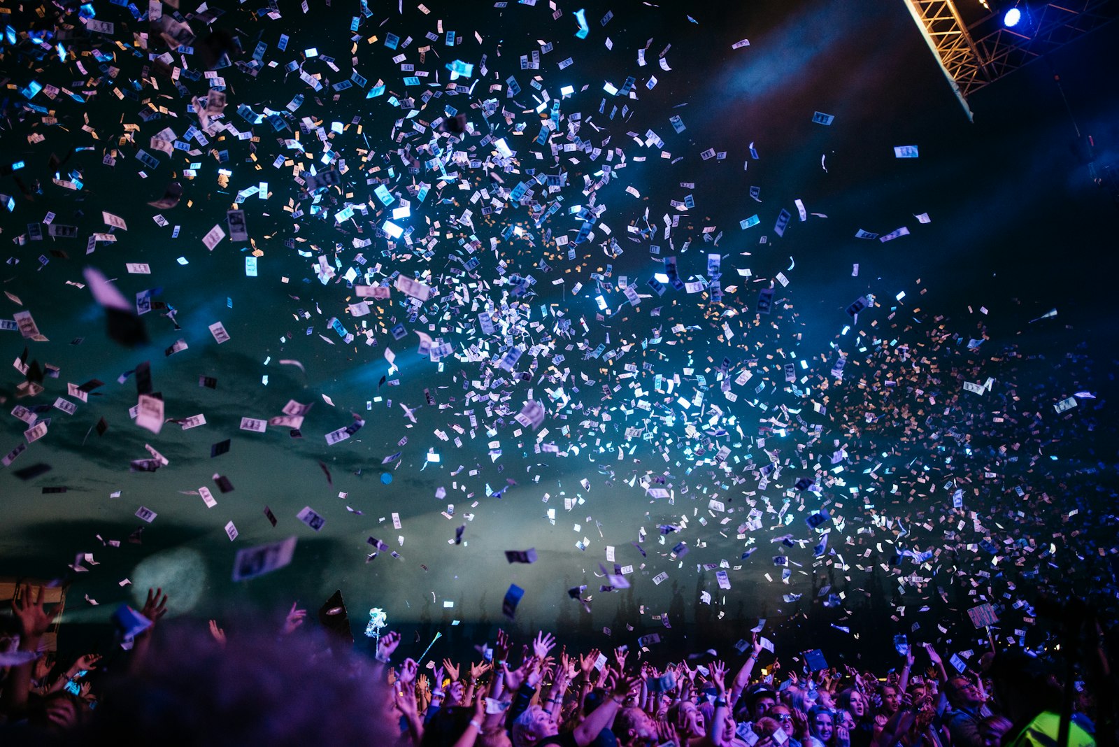 Crowd under warm stage light